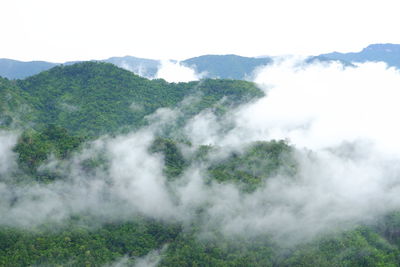 Scenic view of waterfall against sky