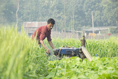 Farmer working at agricultural field