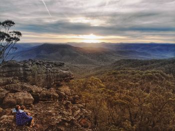 Scenic view of landscape against sky during sunset