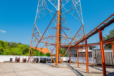 Low angle view of bridge against clear blue sky