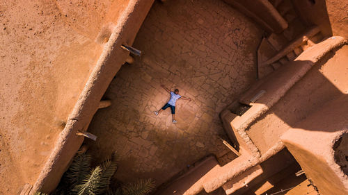 High angle view of people on building wall