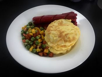 Close-up of breakfast served in plate