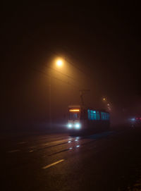 Illuminated street light at night