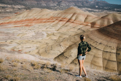 Full length of woman standing on land