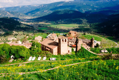 High angle view of townscape against mountain