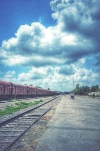 View of road against cloudy sky