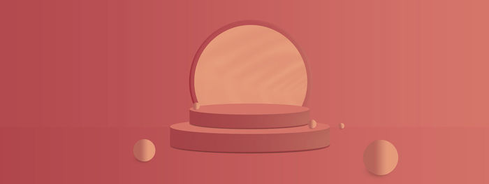 Close-up of electric lamp against red background