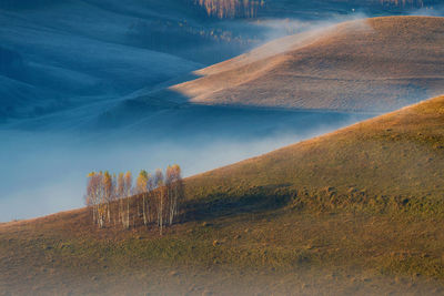 Scenic view of land against sky