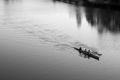 High angle view of people on boat in river