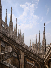 Low angle view of milan cathedral against sky