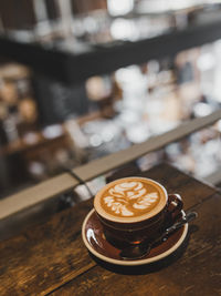 Coffee cup on table