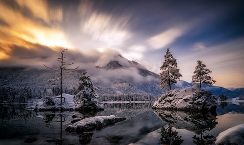 Scenic view of snowcapped mountains against sky during winter