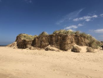 Scenic view of desert against sky