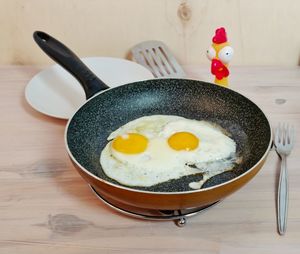 High angle view of egg omelet in cooking pan