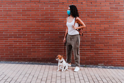 Man with dog on wall