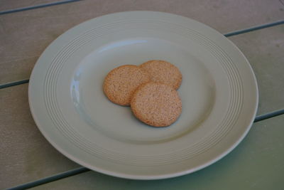 High angle view of cookies in plate