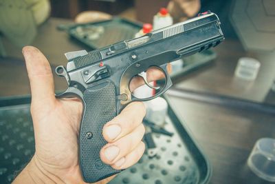 Close-up of person holding handgun