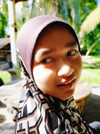 Close-up portrait of smiling girl