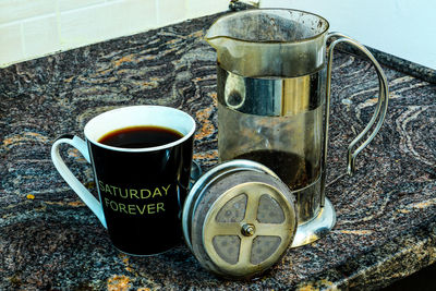 High angle view of coffee cups on table