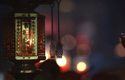 Close-up of illuminated lighting equipment