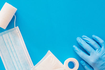Close-up of open book against blue background