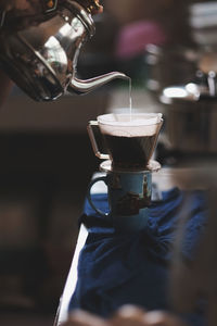Close-up of coffee cup on table in cafe