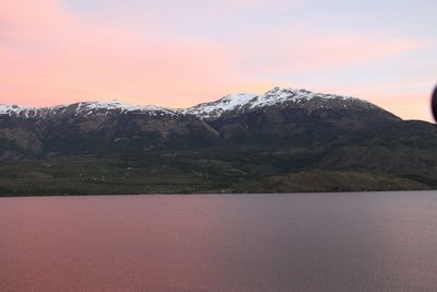 Scenic view of mountains against sky during sunset