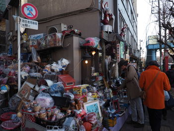 People at market stall