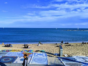 Scenic view of sea against blue sky