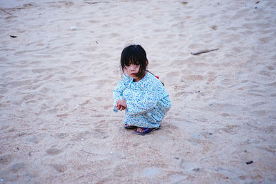 Girl on sand at beach