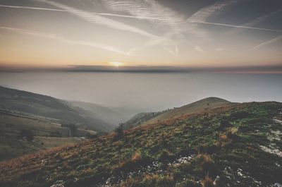 Scenic view of sea against sky at sunset