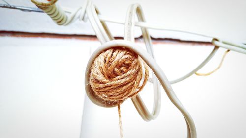 High angle view of bread on table against white background