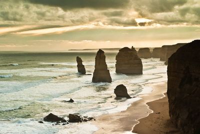 Scenic view of sea against cloudy sky