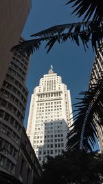 Low angle view of modern buildings against sky