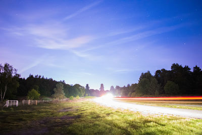 Light trails on road at night