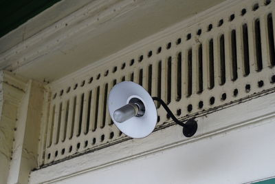 Low angle view of electric fan on ceiling