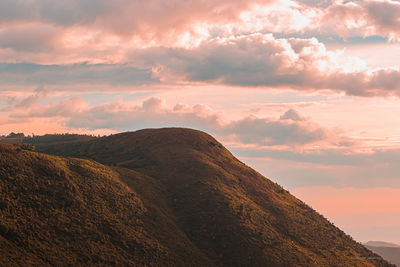 Scenic view of mountains against sky during sunset