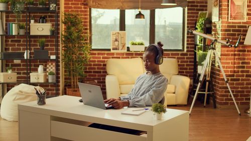 Woman sitting on table