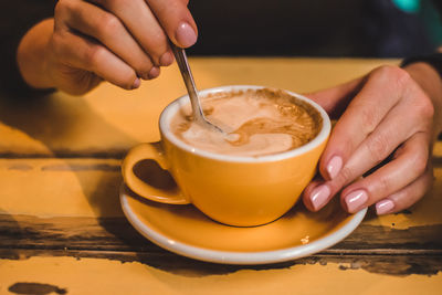 Close-up of coffee cup on table