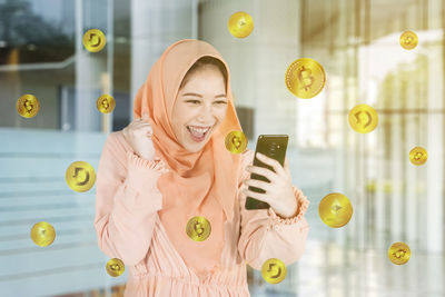 Young woman using smart phone