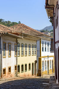 Old and tranquil street with colonial style houses