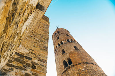 Low angle view of old building against sky