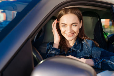 Nice young lady happy car. image beautiful young woman who drives car
