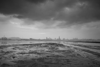 Scenic view of sea against cloudy sky