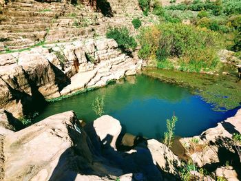High angle view of rock by lake