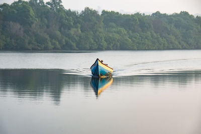 Man in boat on lake