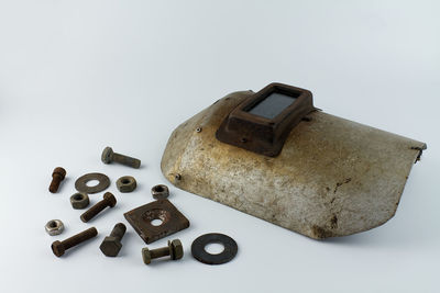 High angle view of machine part on white background