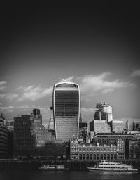 Modern buildings against sky in city