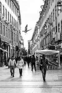 Full length of woman walking in city