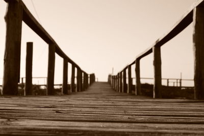 Railroad tracks against clear sky